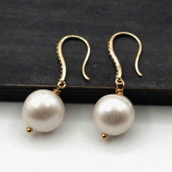 Pearl earrings with...