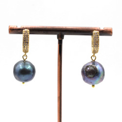 Pearl earrings with...